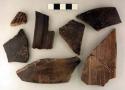 Ceramic sherds, rim & body, polished black, incised, repaired