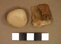 Chipped stone fragment and and 1 unworked pebble