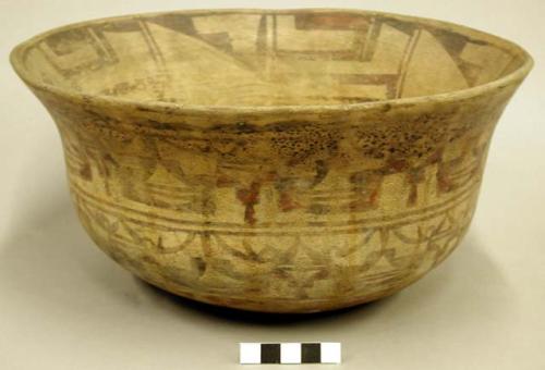 Polychrome bowl. Dark red geometric designs on interior and exterior.