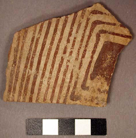 Ceramic body sherd, exterior red on buff linear design