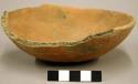 Scoop, probably boat-shaped; rounded base, chipped rim; salt red - 13.4 x 9.4 x