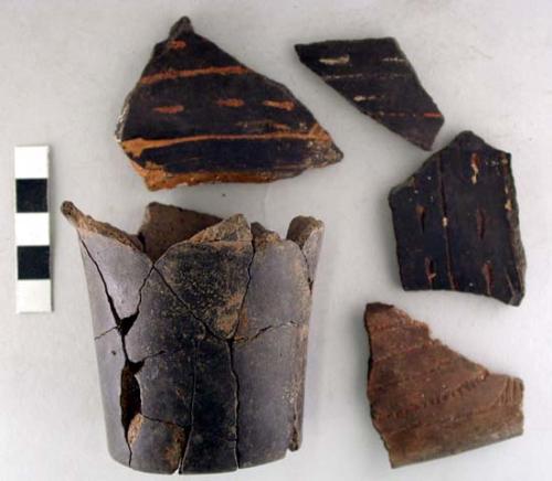 Ceramic sherds, rim/body, incised/ punctate design, repaired