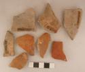 Ceramic body and base sherds, reddish color exterior, some incised