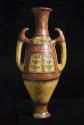 Ceramic handled vessel