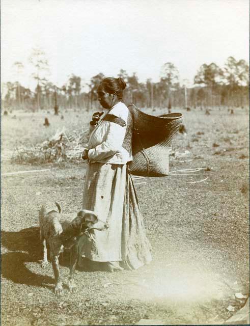 Carrying-Basket in Unusual Position. Louisa. HAY-La Ema with Basket at Bayou Lacombe, Louisiana