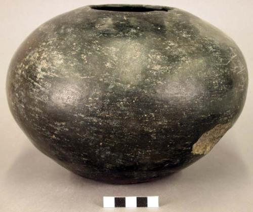 Pottery jar. Globular with small orifice, no neck. Polished black ware