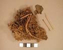 Organic, various remains including hide and soil combined and fiber