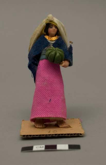 Wax figure of woman with melons - "vendedora de zapallo"
