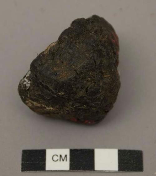 Lump of black pitch with cord impression