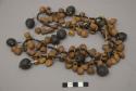 Necklace of small seeds from a bush (these seeds called cangopacha)