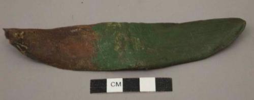 Stiff leather(?) leaf-shaped object, partially painted green
