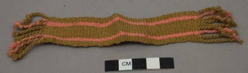 Miniature brown and pink woven belt for doll called egego