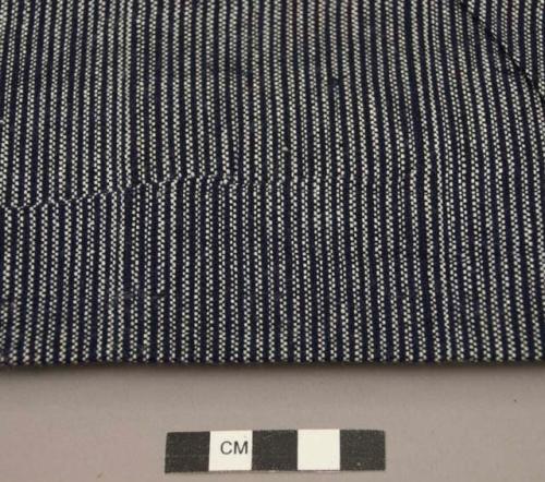 Sample of hand-loomed red, dark blue & white cloth - basket weave
