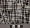 Sample of hand-loomed red and white checked cloth - basket weave