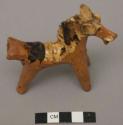 Horse-shaped pottery whistle