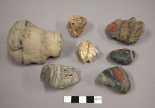 Unworked stones of unusual shape and coloring, said to have been found+