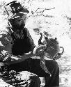 Wilhelm Camm cleaning a teapot