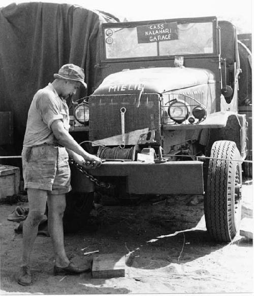 Casper Kruger working on the front of one of the expedition GMC trucks