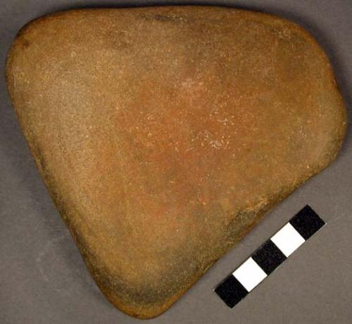 Abrading stone or possible pallette. triangular cobble with two concave faces. 1