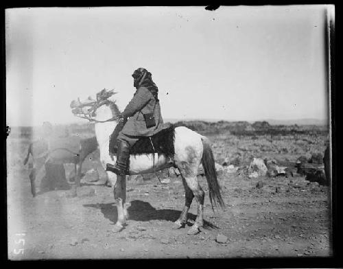 Tribal man on horse in Northern Africa