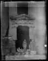 Man standing in facade ruin entryway