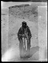 Man standing in traditional tribal clothing