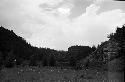 Landscape of field and rock formations