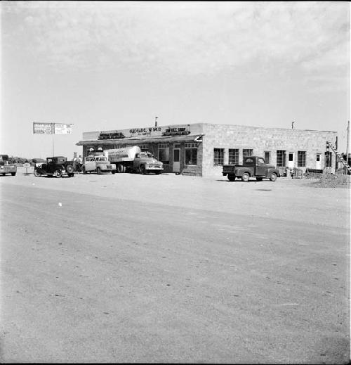 Trucks sit outside a business