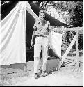 C.R. McGimsey III outside tent