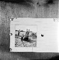 Photograph of a photograph of men working at excavation site