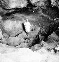 Man stands at excavation site