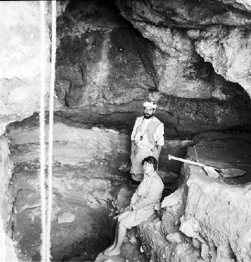 Two workers at excavation site