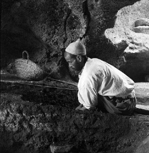 Man works at excavation site