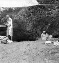 Two workers in excavation