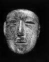 Incised greenstone mask