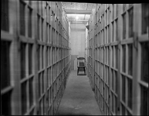 Rows of shelving, basement storage, Peabody Museum, 1967