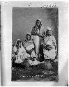 4 Mayan women with baskets