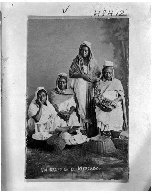 4 Mayan women with baskets