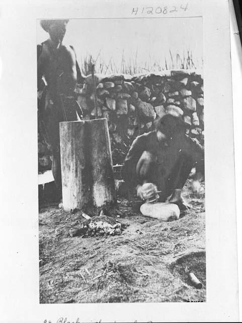 Two blacksmiths at work