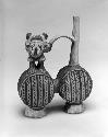 Stirrup pot with animal effigy