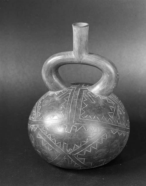 Stirrup pot; black with flat bottom and two incised designs on surface