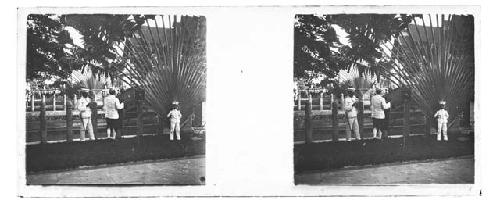 stereo glass slides of Siam; men  in white coats standing next to large fan