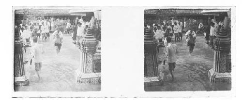 stereo glass slides of Siam; people watching two men piggy back