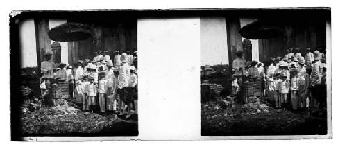 stereo glass slides of Siam; men and boys gathered under umbrella