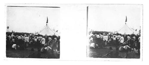 Stereo glass slides of Siam; men gathered at outdoor event