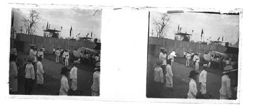 Stereo glass slides of Siam; men in white suits and hat watching event