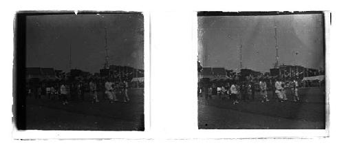 stereo glass slides of Siam; men in white coats on playing field