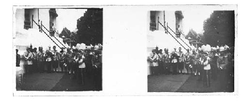 stereo glass slides of Siam; men in uniforms outside entryway