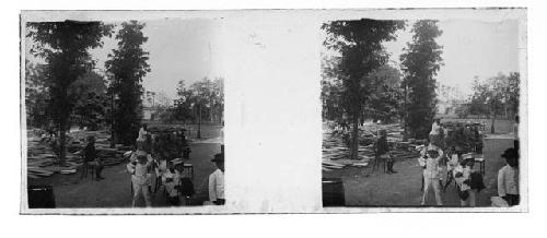 stereo glass slides of Siam; men in uniforms and monks sitting outside