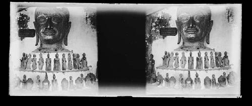 stereo glass slides; buddha figures, large head in foreground